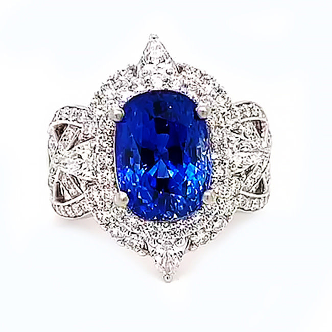 Platinum engagement ring with 7.5 ct blue Sapphire and diamonds. Call for price.