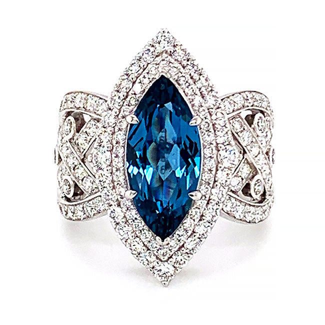 Platinum engagement ring with Marque Rare Blue Zircon and diamonds