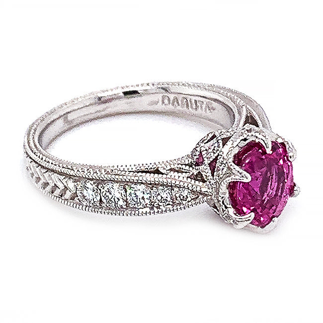 Platinum engagement ring with pink sapphire and diamonds